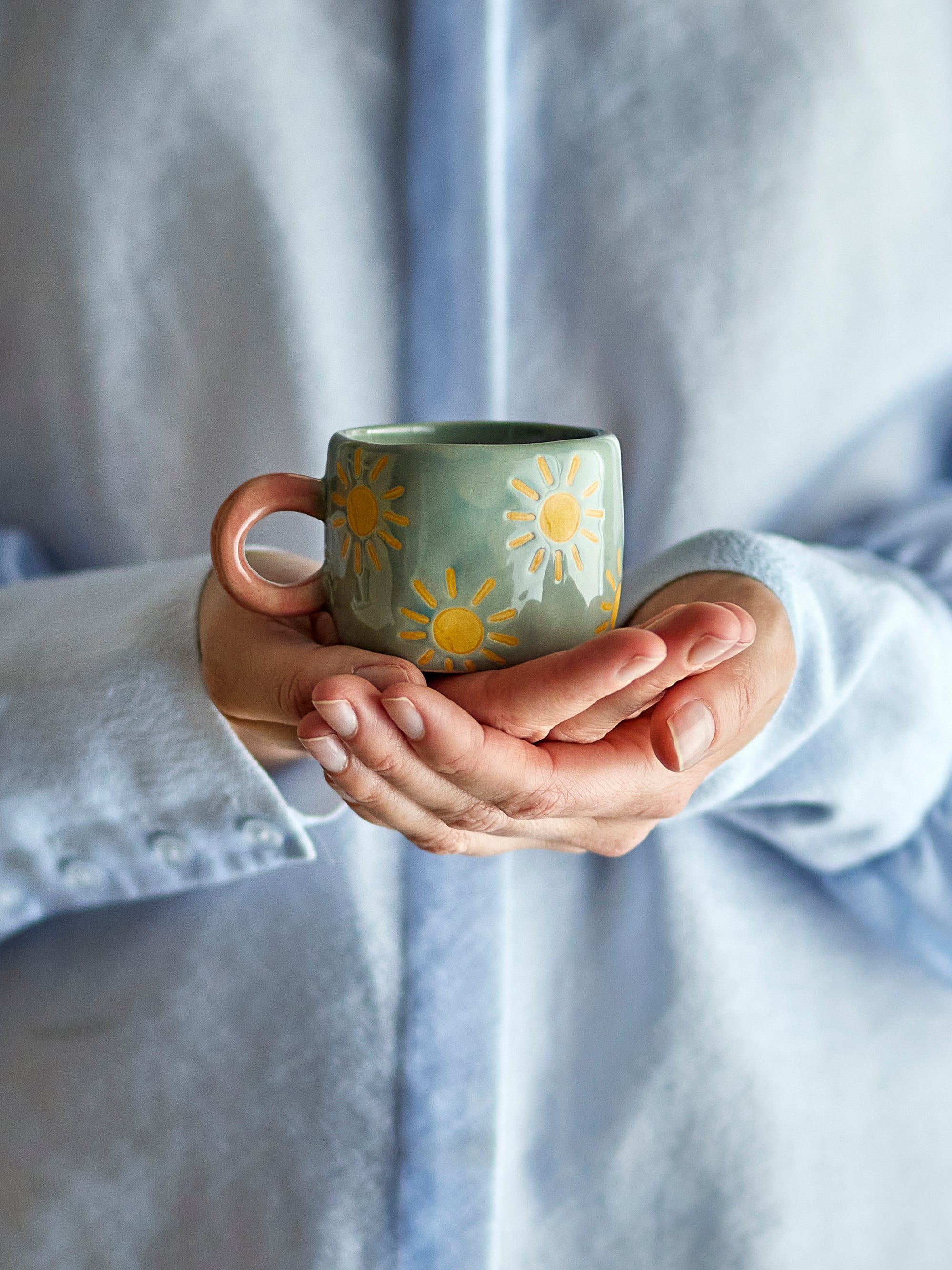 Nini blue stoneware mug with yellow suns