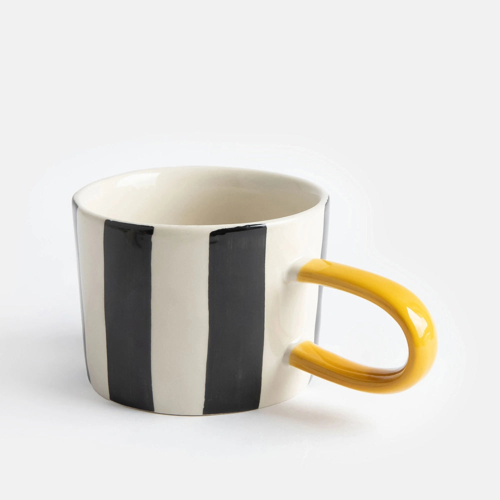 Mono mug with wide black stripes in hand-painted glazed stoneware