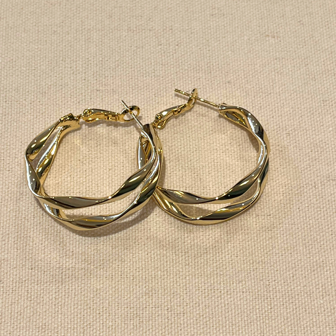 Boucles d'oreilles Waves en acier inoxydable doré