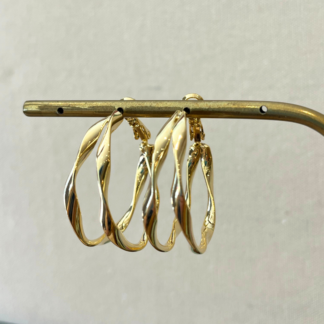 Boucles d'oreilles Waves en acier inoxydable doré