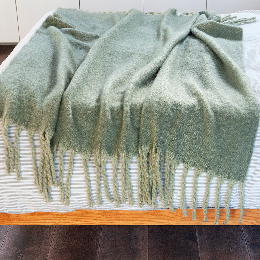 Couverture tissée verte