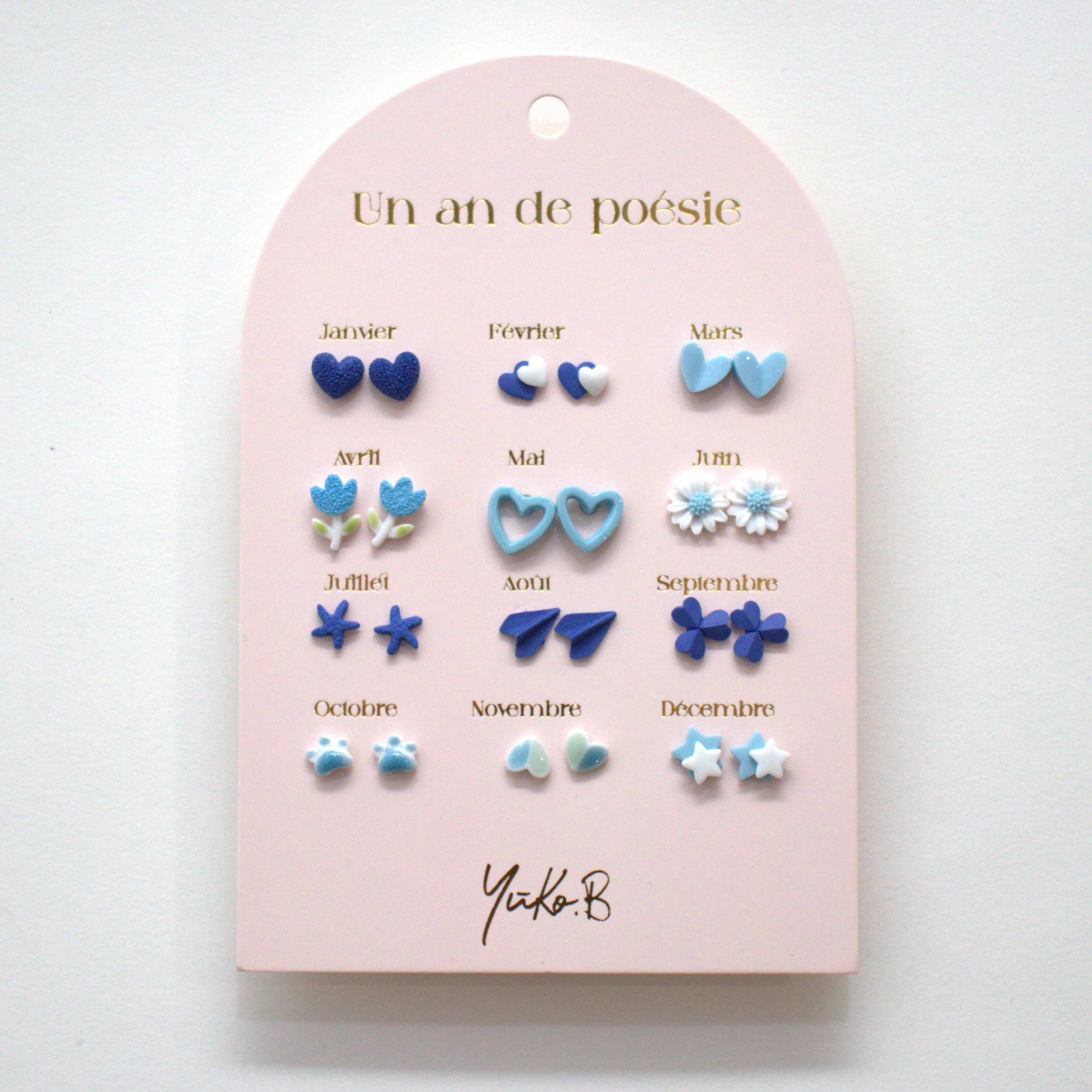 Carte de 12 boucles d'oreilles sur le thème un an de Poésie bleue