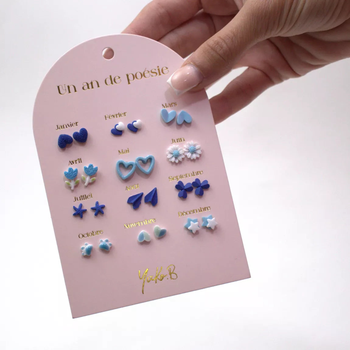 Carte de 12 boucles d'oreilles sur le thème un an de Poésie bleue